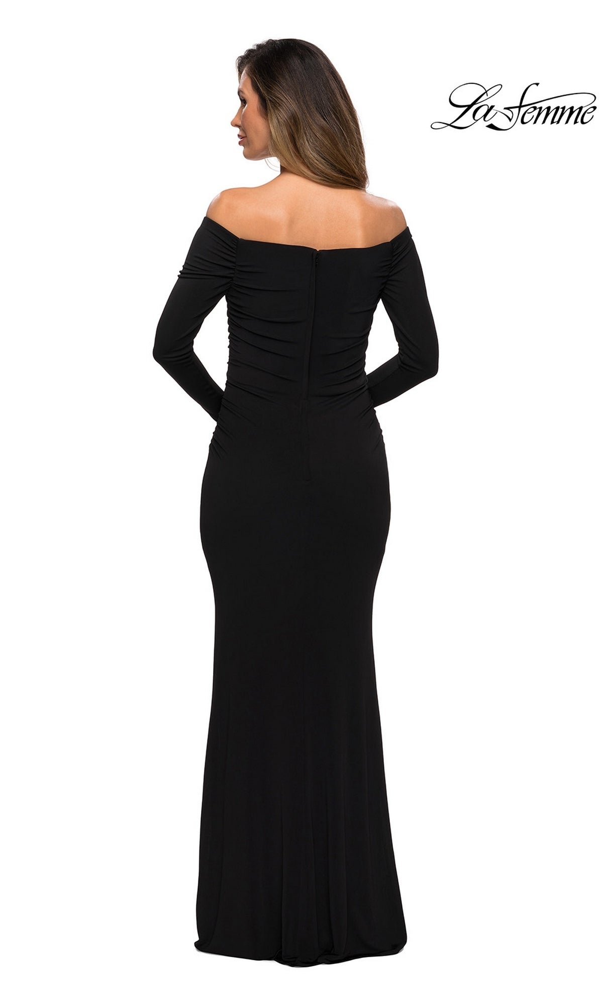 Woman facing away, wearing Long Formal Dress: La Femme 28054—a black off-the-shoulder fitted jersey sheath. Hair is down. “La Femme” logo appears in the top right corner.
